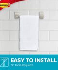 Satin Nickel Hand Towel Bar With 4 Water Resistant Strips, 9 Inch Holder Holds Up To 3 Lb, No Tools Needed, Great For Bathroom Wall, Inside Cabinet Or Shower, Damage Free Mount displayed with towel