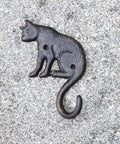 Heavy Duty Cast Iron Cat Wall Hooks Two Pack Featuring A Totally Badass Antique Dark Rust Finish Perfect For Holding Coats Keys And Furry Pet Leashes While Adding Killer Vintage Country Vibes To Your Space, detailed view of single cat hook.