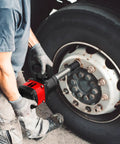 One Inch Air Impact Wrench Built Tough As Nails For Heavy Duty Repair Shops packing 3550 ft lbs of power in use on a truck wheel.