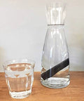 Glass pitcher and water glass with Charcoal Water Purifying Sticks From Kishu Japan For Crisp, Better-Tasting Water, Each Stick Filters Up To 2 Liters