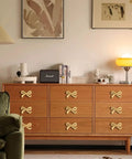 Wooden dresser with vintage bow shaped dresser knobs in antique gold hardware, 4 pack durable solid zinc alloy drawer handles
