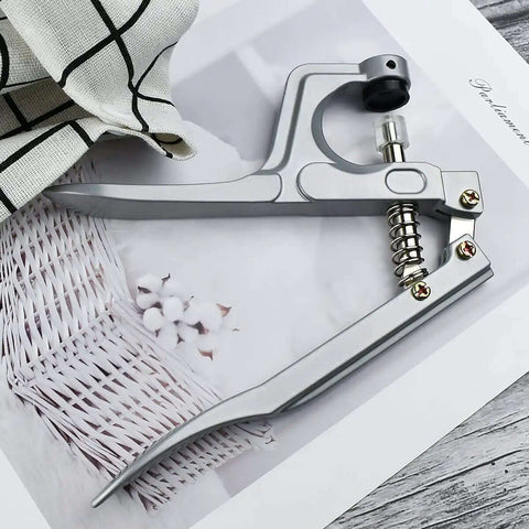 All Purpose Snap Pliers Kit For Crafts And Clothing on woven surface, includes easy snap fastener tool set, no sew button fastener
