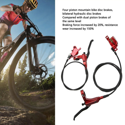 Rock Solid Four Piston Hydraulic Disc Brake Set For Mountain Bikers With Drop Dead Smooth Bilateral Oil Lines And Tough Resin Pads, showing red brake levers and hoses.