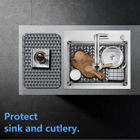 Gray silicone sink mat grid for kitchen sink protects glassware and stainless steel surfaces, fits 12 to 30 inch sinks.