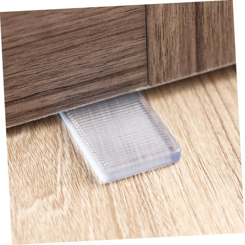 36 Piece Heavy Duty Leveling Shims For Furniture Stabilizer Bed Risers Non Slip Couch Block under a wooden table leg.