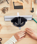 Heavy Duty Aluminum Alloy Table Saw Miter Gauge With Dead Straight Accuracy And Smooth Telescoping Arms For Rock Solid Cut Line Alignment And No Fuss DIY Woodworking on workbench with hands