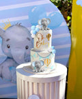 Too Cute Elephant Themed Cake Decor Set For Baby Birthday Cakes With Mini Elephants Blue And White Pearl Balls Hot Air Balloon Accents