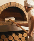 37 Inch Wood Handle Pizza Oven Brush With Scraper, Grime Bustin Outdoor Cleaning Tool With Brass Bristles And Steel Scraper in use