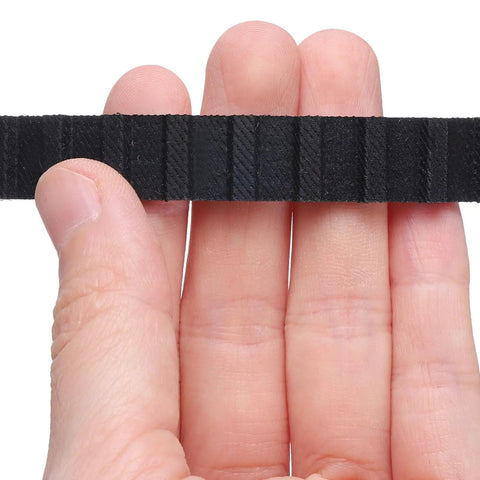 Close-up of hand holding 28.5 Inch Pitch Timing Belt 0.5 Inch Wide 0.18 Inch Thick With 76 Teeth, Beefy Closed Loop Neoprene Rubber Drive Belt