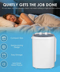 Heavy Duty Portable Washing Machine With 5.5 Pound Capacity And Quick 110V Spin Cycle Super Easy Space Saving Laundry Lifesaver For Tiny Apartments Dorms RV And Road Trips Grey next to a woman sleeping peacefully.