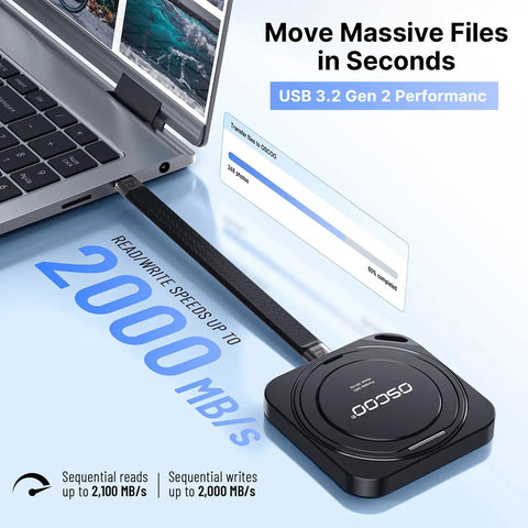 1TB Portable Magnetic Phone SSD With Stand Up To 2000MBps External Solid State Drive beside laptop, cable connected