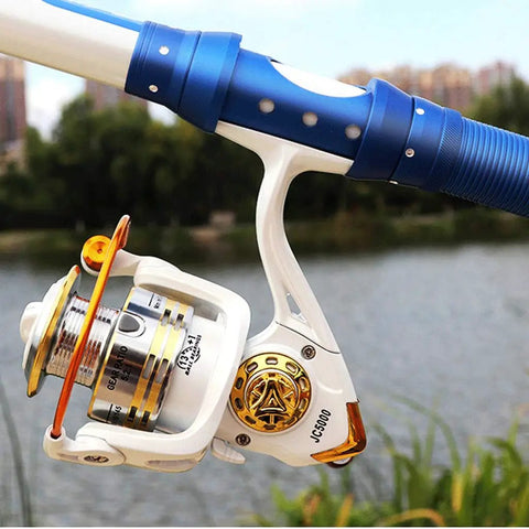 Beefy Saltwater Spinning Reel With Anti Corrosion Coating 9Kg Drag 12 Plus 1 Stainless Bearings attached to blue fishing rod