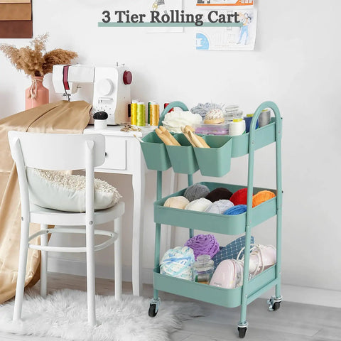 3 Tier Rolling Cart With Lockable Wheels And Hanging Cups, metal utility cart in sewing room near white desk
