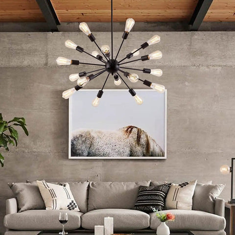Black 18 Light Starburst Chandelier Pendant Light 36 Inch Wide above a gray sofa in a modern living room setting.