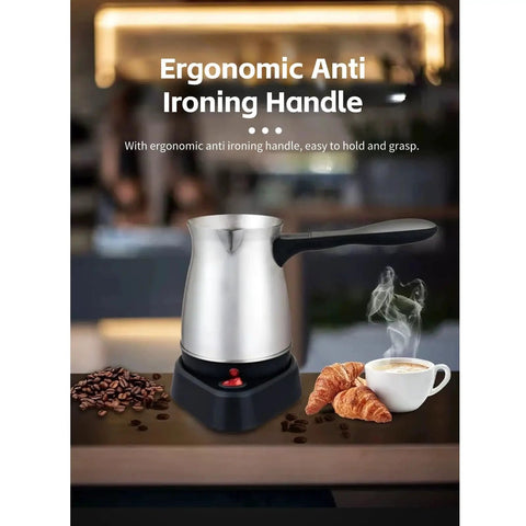 Electric 600ml Do It All Coffee Pot With Stainless Steel Kettle And Ergonomic Handle For Home Use on counter with coffee and croissants.