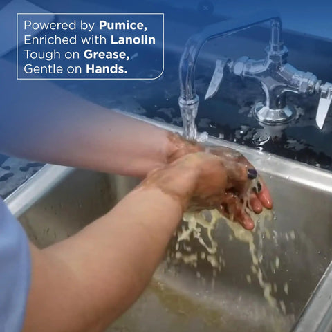 Hands washing with Heavy Duty Industrial Hand Cleaner With Pumice And Lanolin Real Deal Strength Against Grease And Grime Refill Only Without Pump.
