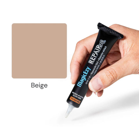 Hand holding MagicEzy tube next to beige color swatch for Beige Porcelain Tile Repair Kit With Nanotech Filler For Chips And Cracks