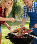 Stainless Steel Grill Basket With Detachable Handle For Outdoor Grilling Perfect For Fish Meats And Veggies Flip Easy And Even Heating A Slick Gift For Dad Camping And BBQ Lovers All In One Grilling Solution in use by two people at a barbecue