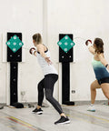 Two people practicing with Dope Dual Sided Rubber Fencing Training Target Wall Mounted For Indoor And Outdoor Use Lightweight