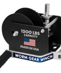 Heavy Duty Drill Powered Winch With Fifth Eighth Inch Hex Drive And Removable Socket Handle Built Tough As Nails For Loading Trailers And Pulling Heavy Beams At 1500 Lb Capacity Made In USA close-up view of the winch showing the handle and capacity label.
