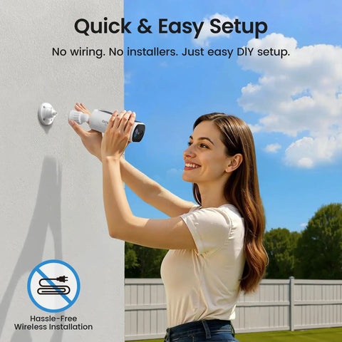Person installing solar security cameras wireless outdoor kit with 2 minute easy DIY install no subscription required, sunny day.