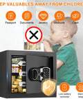 Compact Home Fireproof Safe With Programmable Keypad And Alarm shown with open door revealing contents, child nearby