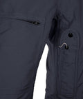 Heavy Duty Poly Cotton Twill Coverall In Dark Navy With Alpha Fit Snag Resistant Trims showing utility pant details and pockets.