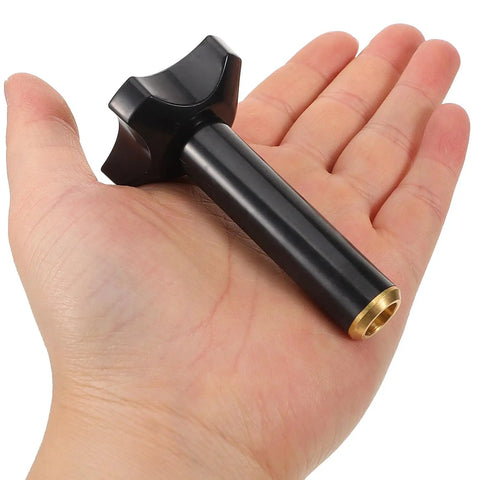 Plastic Ice Cream Maker Nut Fastener Replacement Part held in hand, black durable material, universal fit for machines
