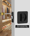 Black pocket door lock for sliding doors with privacy latch being installed on interior door, fits 1-3/8 to 2-3/16 inches thick.