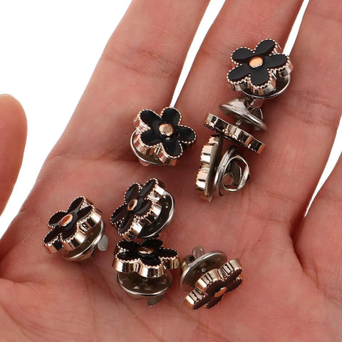 Total Fashion Hack With These Pocket Ready Black Flower Button Covers And Alloy Brooch Pins For Dresses No Sew Snap Fasteners in hand.