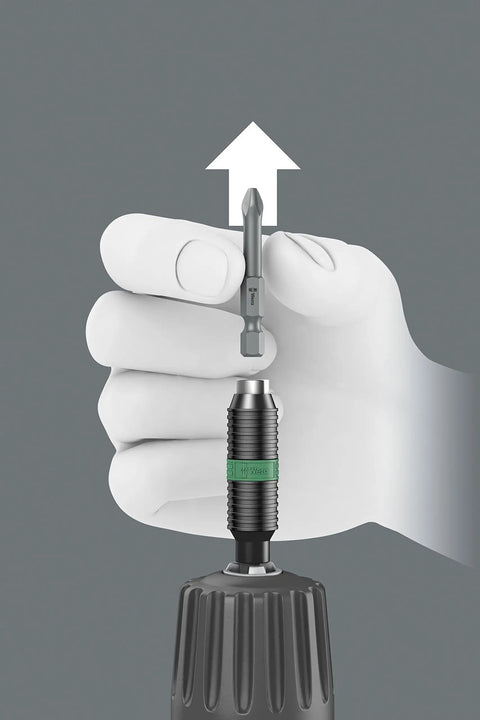 Hand demonstrating Hexagon 897 Four R SB BiTorsion Rapidaptor Universal Bit Holder for quarter inch shank with rapid spin chuck.