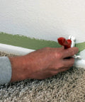 Person using Pack Of 2 Edger Shield For Baseboards And Uneven Trim, Paintbrush Not Included, Attaches To Any 2 Inch Brush