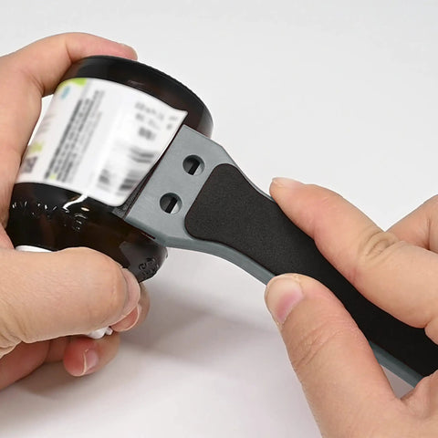 Two Pack Plastic Razor Scraper With Six Inch Long Handle And One Hundred Double Edge Blades, Heavy Duty Adhesive Remover Tool in use