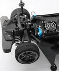 Radio Control Car Transmission Upgrade Kit With Low Noise Belt Drive Conversion For TT02 1 To 10 Scale Radio Control Cars CNC Machined Gears System Durable High Precision Parts To Boost Power Transfer And Smooth Shifts. RC chassis close-up