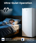 Slick 6.5 Cubic Foot Upright Freezer In Clean White in bedroom, showcasing ultra-quiet operation while child sleeps.