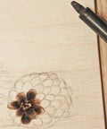 Basswood sheet for arts and crafts, 16 x 12 x 1/8 in, unfinished light wood with pencil flower sketch.