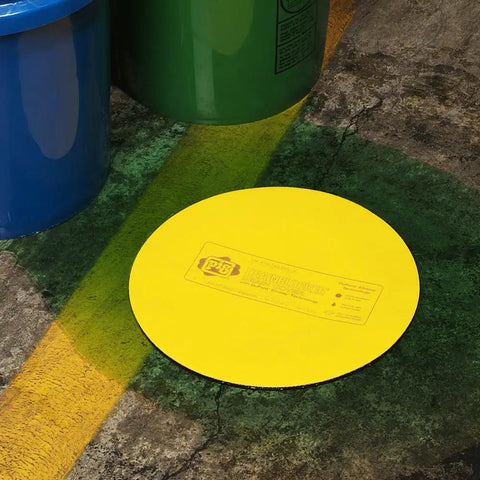 Beefy Heavy Duty Storm Drain Cover For Round Drains Up To 6 Inches Diameter, on concrete near colored bins
