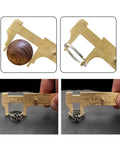 Solid Brass Digital Caliper High-Precision Mini Tool Crafts Jewelry measuring wooden ball and silver ring.