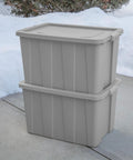Tough As Nails 30 Gallon Storage Bins With Secure Lids Heavy Duty Plastic Totes Set Of 8 stacked gray bins on a snowy surface.
