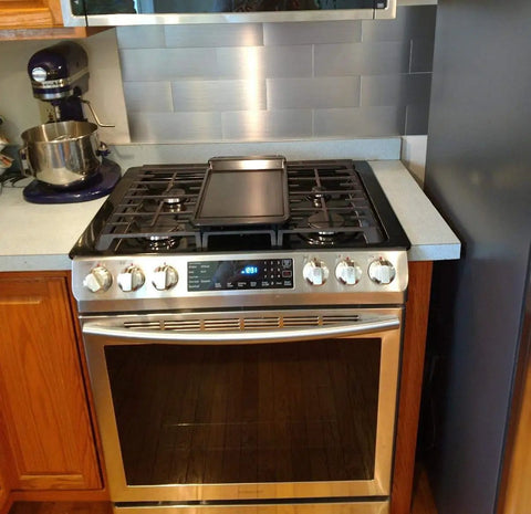Stainless Steel Peel And Stick Kitchen Backsplash Tiles 4x12 Inch Self Adhesive Metal Tiles 30 Pack Dry Install No Mess Easy DIY Makeover Covers 10 Sq Ft behind stove