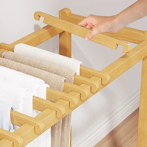 Top Shelf Rolling Clothes Rack Featuring Heavy Duty Swivel Wheels And Sturdy Natural Wood Slats Designed For Effortless Trouser Storage Within Any Spacious Bedroom Or Small Living Area