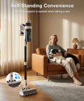 Cordless Vacuum Cleaner With 55 Minutes Runtime 15 In 1 Self Standing Stick Vacuum in living room with woman and dog