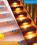 Solar Fence Post Lights 6 Pack illuminating outdoor wooden stairs at night with warm white light, waterproof solar powered LED lights