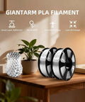 Two spools of Crystal Clear PLA Filament 1.75Mm 1Kg on a table next to a printed vase, featuring smooth printing and low shrinkage.