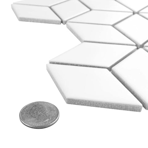 Metro Rhombus Matte White Porcelain Tile For Floor And Wall, 10.5 In By 12.13 In Mesh Mounted Mosaic with quarter for scale