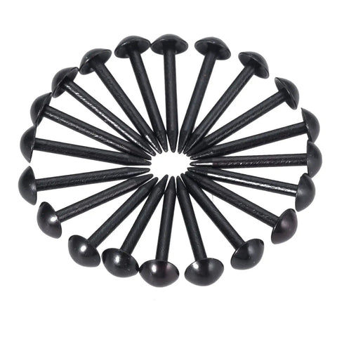 Premium Black Iron Round Head Upholstery Nails And Smooth Furniture Decorative Tacks Stock Up On These Gotta Have Hardware Gems For Any Weekend Warrior Project Around The House 100 Pack arranged in a circle.