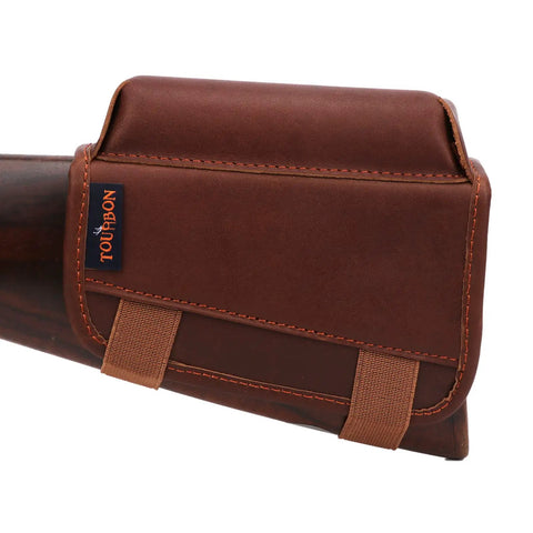 Genuine Leather Buttstock Cheek Rest with Rifle Shell Holder showing brown leather and stitching detail on firearm.