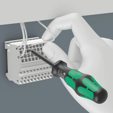 Pro Grade Actuation Tool For Terminal Blocks And Spring Cages, Slim 0.6 X 3.5 X 81 mm Blade in use, adjusting tight boxes
