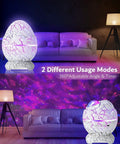 Dinosaur Eggs Galaxy Star Projector With Bluetooth Nebula LED Night Light illuminating a purple nebula effect in a living room.