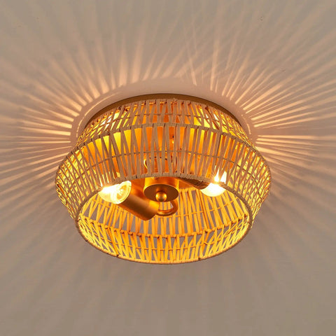 Natural Rattan Flush Mount Ceiling Light Fixture In Antique Brass Brush Finish With Two Lights casting warm glow